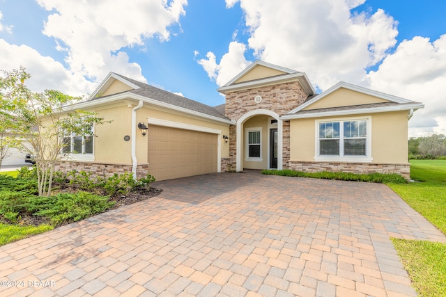 view of front of property with a garage