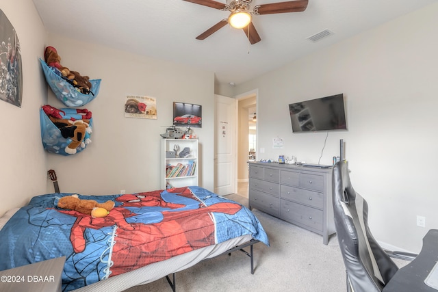 carpeted bedroom featuring ceiling fan