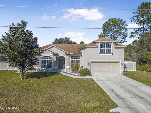 view of front of home featuring a garage and a front lawn