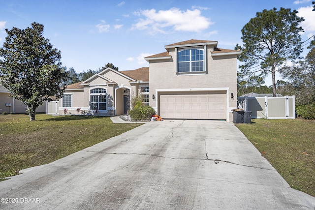 view of front of home with a garage and a front yard