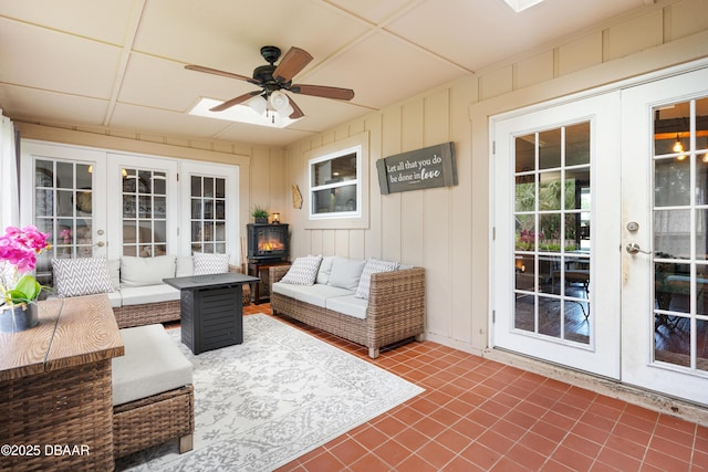 840 River Oak Dr W, Ormond Beach, FL 32174 - sunroom featuring french doors and a wood stove