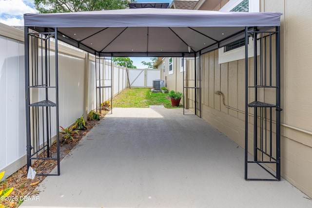 840 River Oak Dr W, Ormond Beach, FL 32174 - view of patio featuring a gazebo and a carport
