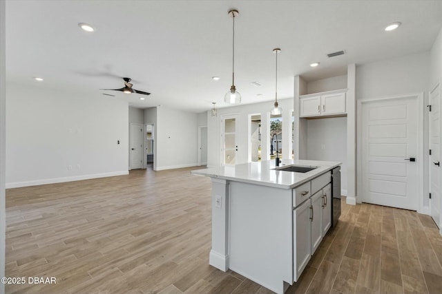 2 Seamanship Trl, Palm Coast, FL 32164 - kitchen with a sink, ceiling fan, light wood-style floors, light countertops, and recessed lighting