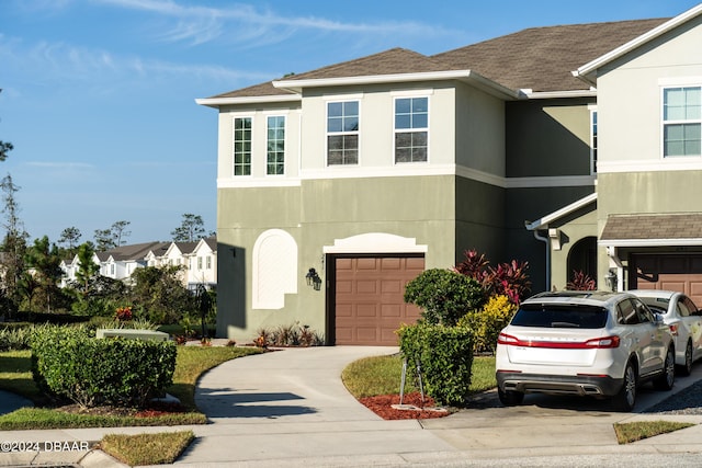 view of front of property with a garage