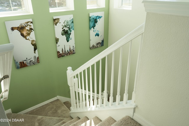 stairway featuring tile patterned floors