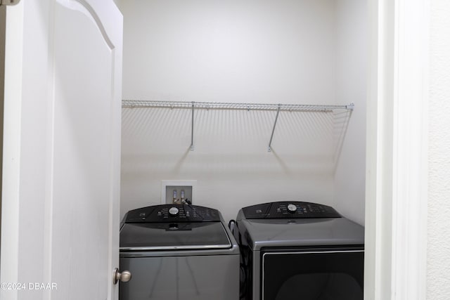 laundry area featuring separate washer and dryer