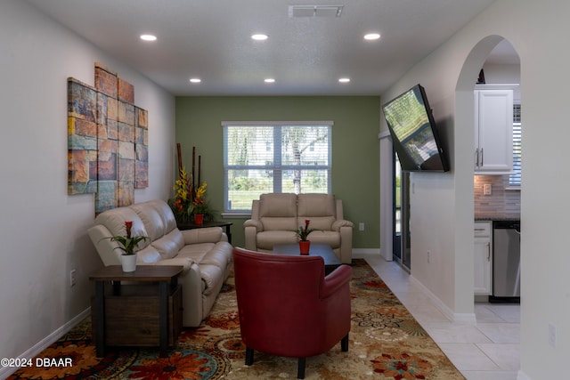 living room featuring light tile patterned floors