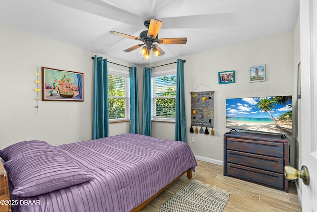 bedroom featuring ceiling fan