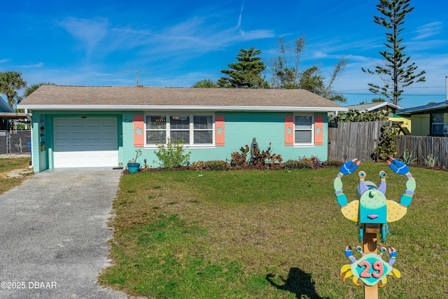 single story home with a garage and a front lawn