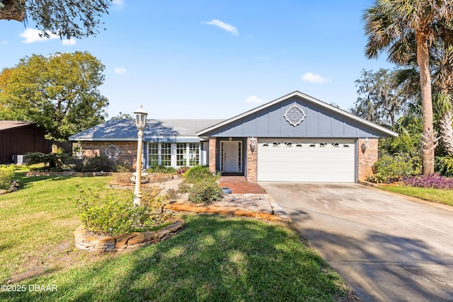 ranch-style house featuring a garage and a front lawn