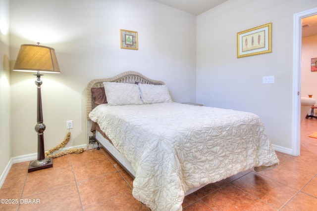 bedroom featuring tile patterned floors