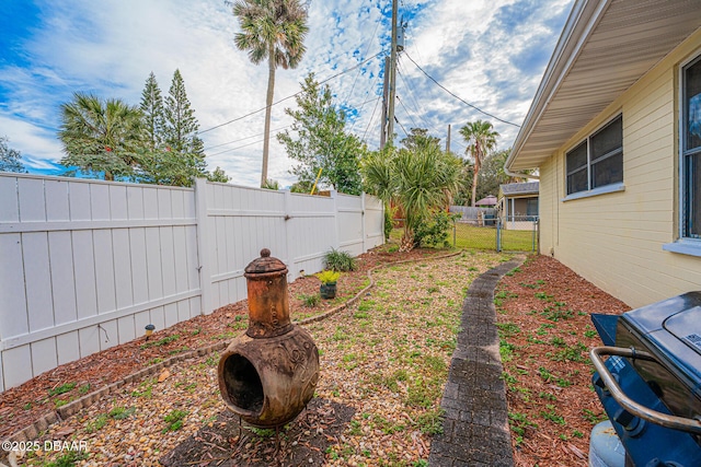 view of yard featuring a fenced backyard