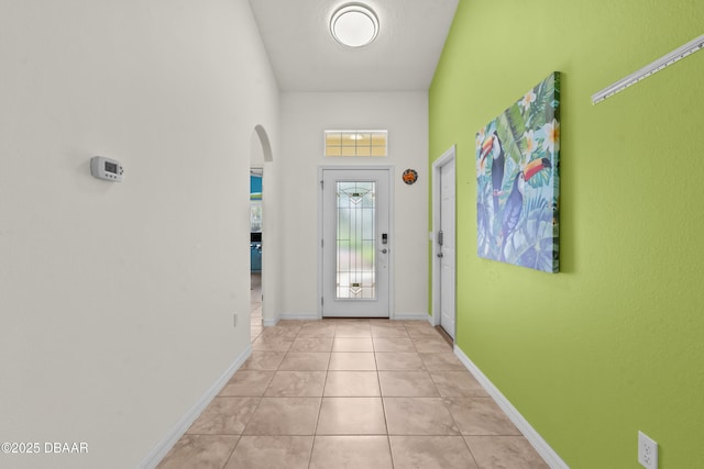 34 Raintree Cir, Palm Coast, FL 32164 - entryway featuring arched walkways and light tile patterned floors