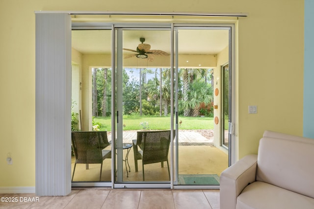 34 Raintree Cir, Palm Coast, FL 32164 - doorway featuring healthy amount of natural light and light tile patterned floors