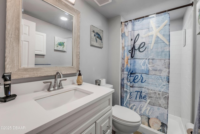 721 S Beach St Unit 215A, Daytona Beach, FL 32114 - full bath with toilet, vanity, and a shower with curtain