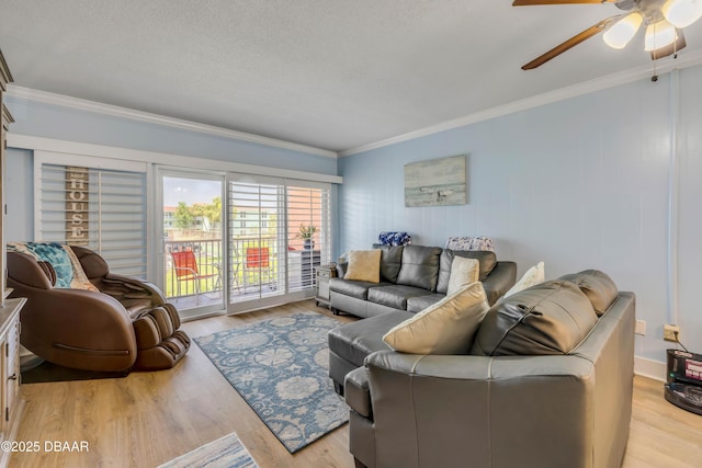 721 S Beach St Unit 215A, Daytona Beach, FL 32114 - living area with crown molding, a ceiling fan, and light wood-type flooring