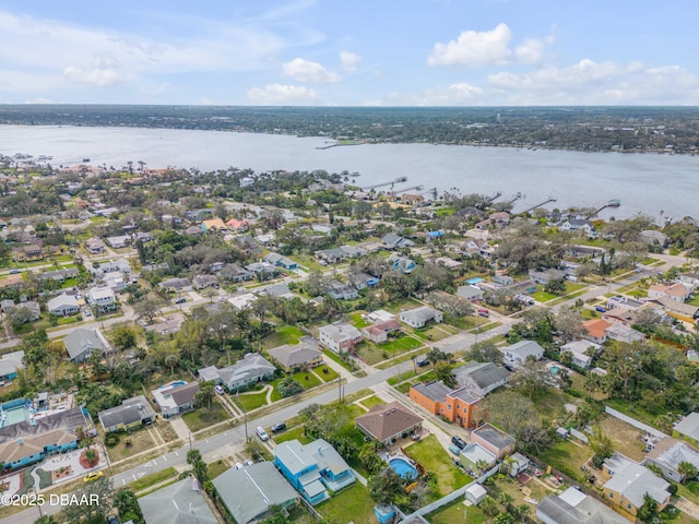 aerial view featuring a residential view and a water view