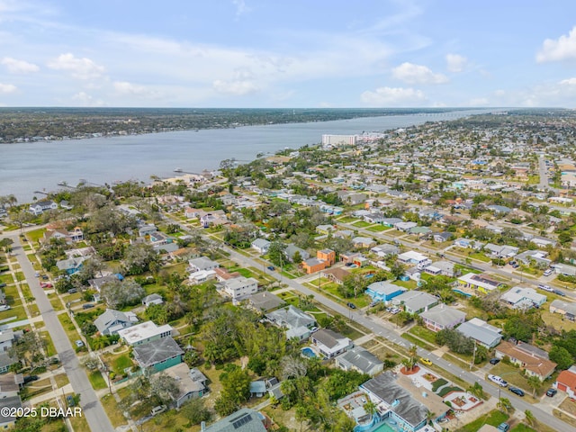 birds eye view of property featuring a residential view and a water view