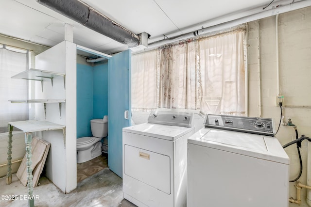 laundry area with laundry area and washing machine and clothes dryer