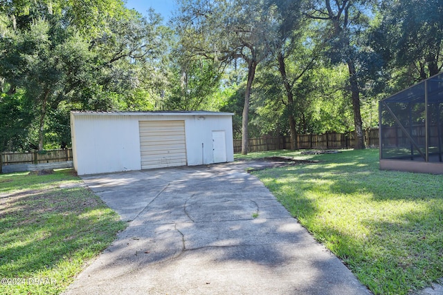 garage with a lawn