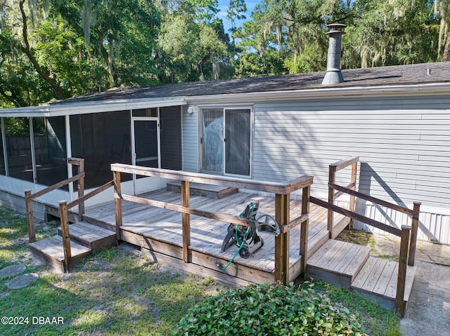 deck with a sunroom