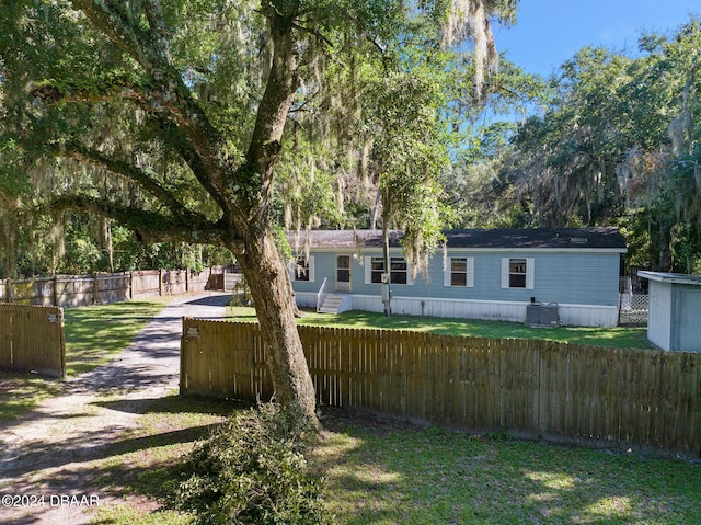 view of yard with central AC