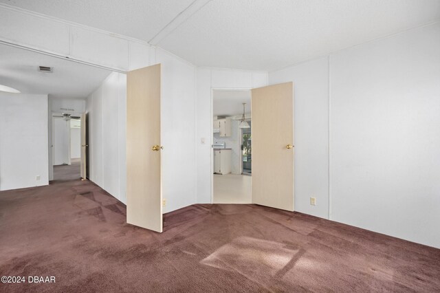 unfurnished room with carpet floors