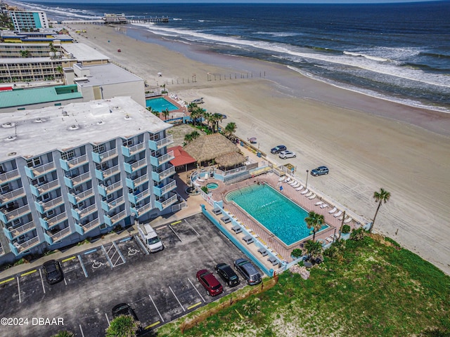 bird's eye view with a beach view and a water view