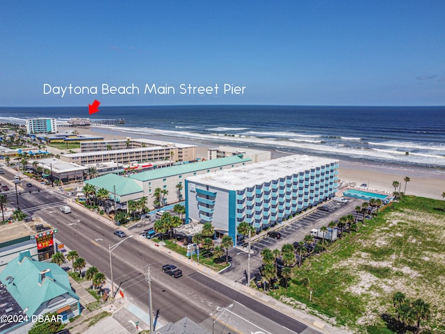 aerial view featuring a beach view and a water view