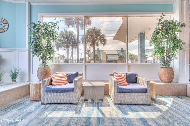 sunroom / solarium featuring plenty of natural light