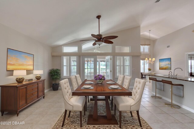 438 Harbour Town Ln, Ormond Beach, FL 32174 - unfurnished living room featuring carpet flooring, vaulted ceiling, a chandelier, ornate columns, and baseboards