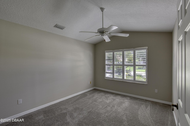 438 Harbour Town Ln, Ormond Beach, FL 32174 - spare room with ceiling fan, carpet, a textured ceiling, baseboards, and vaulted ceiling