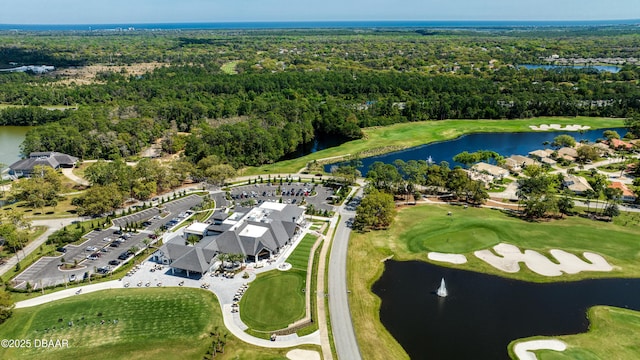 438 Harbour Town Ln, Ormond Beach, FL 32174 - aerial view of property and surrounding area featuring a large body of water, a forest, and a golf course