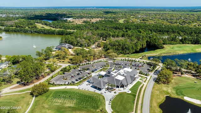 438 Harbour Town Ln, Ormond Beach, FL 32174 - aerial view of property and surrounding area featuring a nearby body of water, a heavily wooded area, and a local golf course
