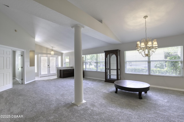 438 Harbour Town Ln, Ormond Beach, FL 32174 - unfurnished room featuring lofted ceiling, french doors, carpet, baseboards, and a chandelier