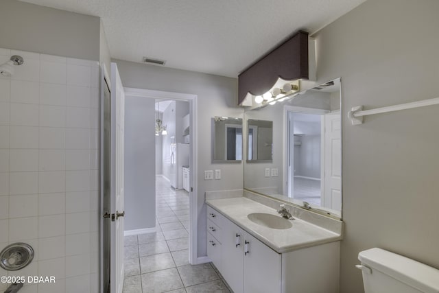 438 Harbour Town Ln, Ormond Beach, FL 32174 - bathroom with tile patterned floors, vanity, and toilet