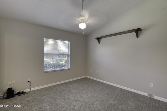 438 Harbour Town Ln, Ormond Beach, FL 32174 - spare room featuring ceiling fan, carpet flooring, baseboards, and vaulted ceiling