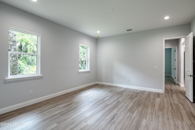 empty room featuring light hardwood / wood-style floors