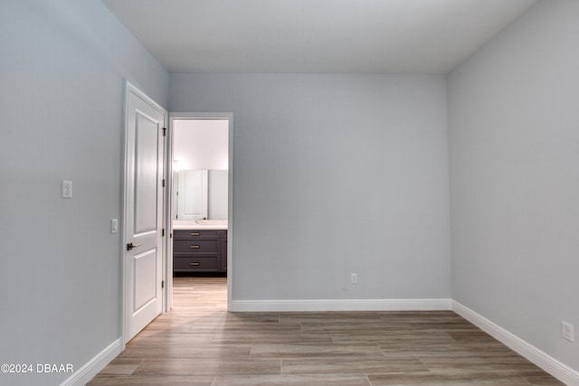 unfurnished room featuring light hardwood / wood-style floors