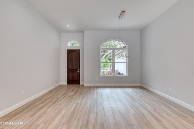 foyer with light wood-type flooring