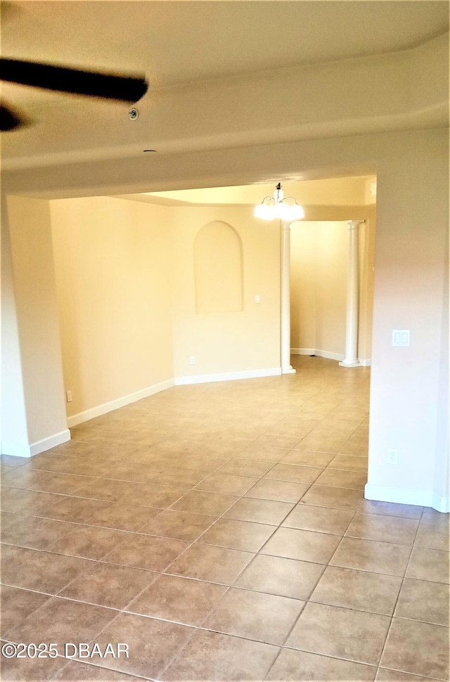 unfurnished room featuring light tile patterned floors