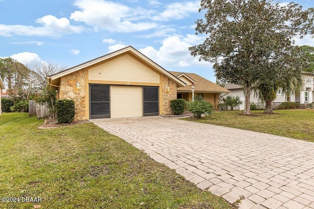 ranch-style house with a front yard and a garage