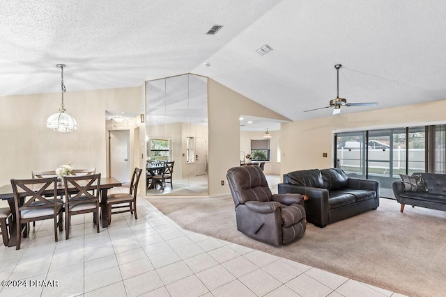 living room featuring light carpet, vaulted ceiling, ceiling fan with notable chandelier, and a textured ceiling