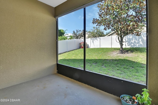 unfurnished sunroom with plenty of natural light