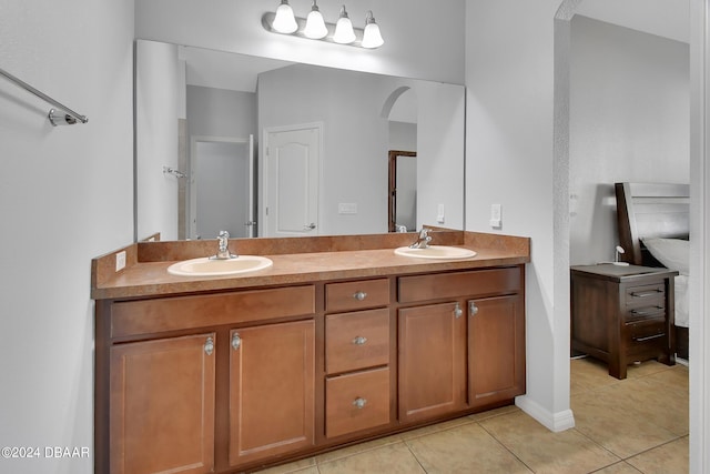 bathroom featuring vanity and tile patterned flooring