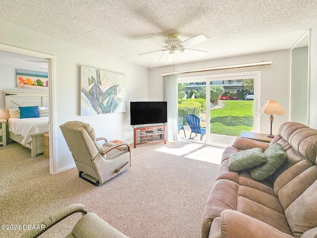 100 Silver Beach Ave Unit 118, Daytona Beach, FL 32118 - carpeted living area featuring ceiling fan and a textured ceiling
