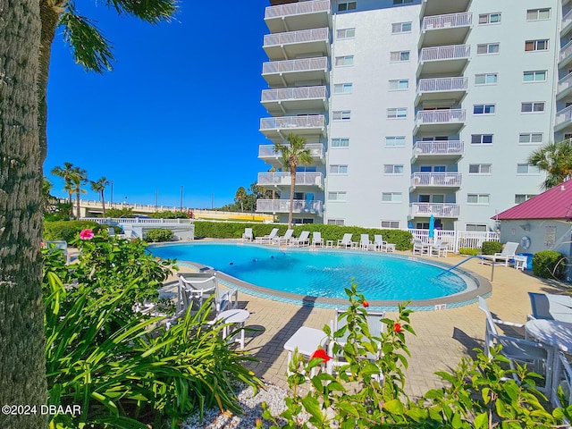 100 Silver Beach Ave Unit 118, Daytona Beach, FL 32118 - community pool with a patio area