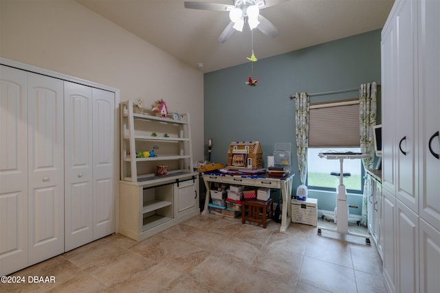 interior space featuring ceiling fan