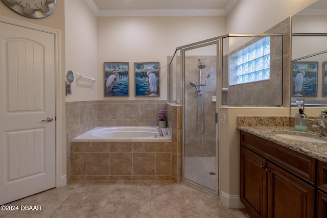 bathroom featuring ornamental molding, vanity, and independent shower and bath