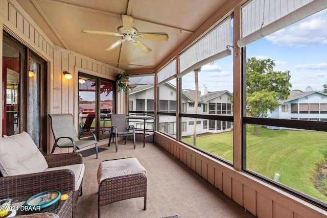 sunroom featuring plenty of natural light and ceiling fan